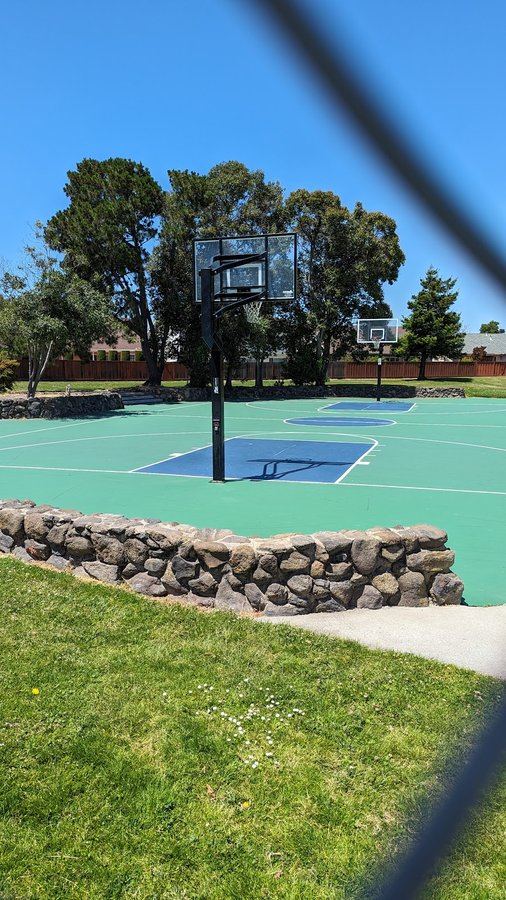 Edgewater Park basketball court. No public photo of the Edgewater tennis courts was found.